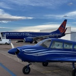 N7856N at KCOS in front of a Boeing 737